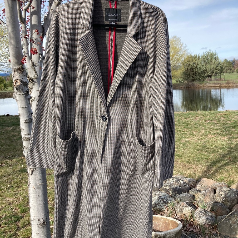 Long trench coat.  Light weight knit fabric. Great for Spring! NWOT